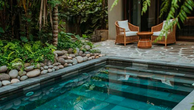 River stone for garden decoration with teak furniture.